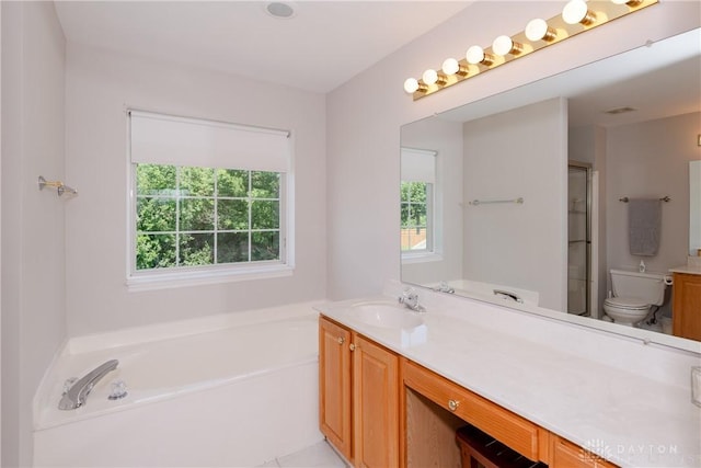 2384 Flyway Ct, Beavercreek, OH 45431 - bathroom featuring vanity, a bath, and a shower with shower door