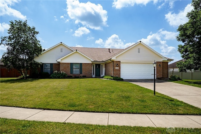 6426 Anvil Dr, Waynesville, OH 45068 - ranch-style home featuring driveway, an attached garage, and brick siding