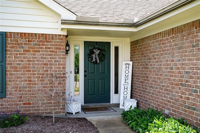 6426 Anvil Dr, Waynesville, OH 45068 - doorway to property with brick siding and a shingled roof