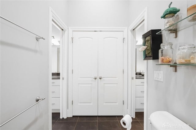 7921 Locust Grove Ct, Springboro, OH 45066 - bathroom featuring tile patterned flooring and a closet