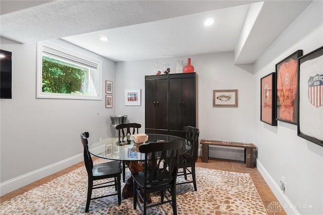 7921 Locust Grove Ct, Springboro, OH 45066 - dining space with tile patterned flooring and recessed lighting