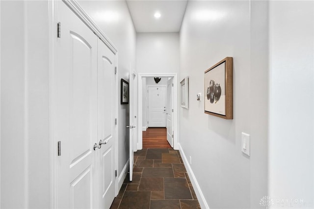 7921 Locust Grove Ct, Springboro, OH 45066 - hallway featuring stone tile flooring and recessed lighting