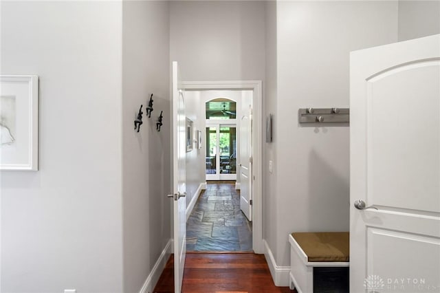7921 Locust Grove Ct, Springboro, OH 45066 - hallway featuring baseboards and dark wood-style floors