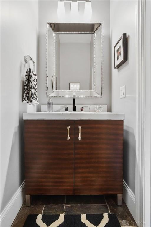 7921 Locust Grove Ct, Springboro, OH 45066 - bathroom with baseboards and vanity