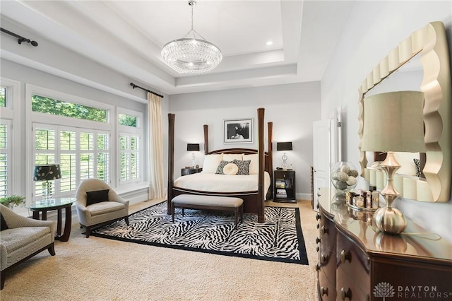 7921 Locust Grove Ct, Springboro, OH 45066 - carpeted bedroom featuring a chandelier, a tray ceiling, and recessed lighting