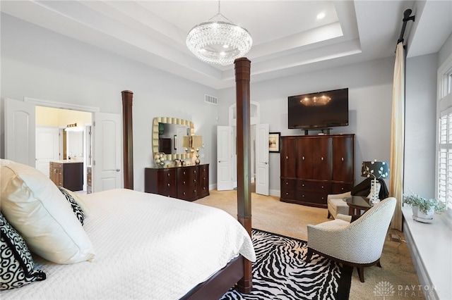 7921 Locust Grove Ct, Springboro, OH 45066 - bedroom with carpet floors, a tray ceiling, a chandelier, and ensuite bath