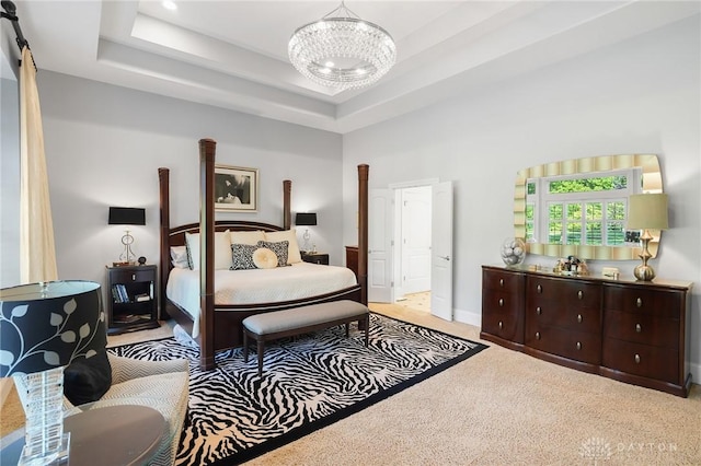 7921 Locust Grove Ct, Springboro, OH 45066 - carpeted bedroom featuring a chandelier and a raised ceiling