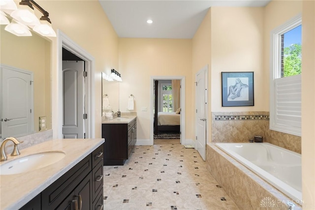 7921 Locust Grove Ct, Springboro, OH 45066 - full bathroom featuring two vanities, a bath, and ensuite bathroom