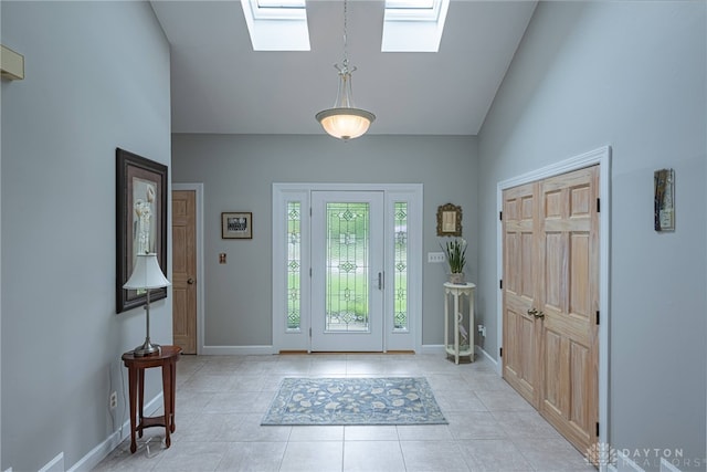5010 Rhine Way, Centerville, OH 45458 - entrance foyer featuring a skylight, high vaulted ceiling, and light tile patterned floors