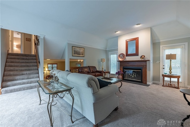 5010 Rhine Way, Centerville, OH 45458 - carpeted living area featuring stairway, lofted ceiling, and a fireplace with flush hearth