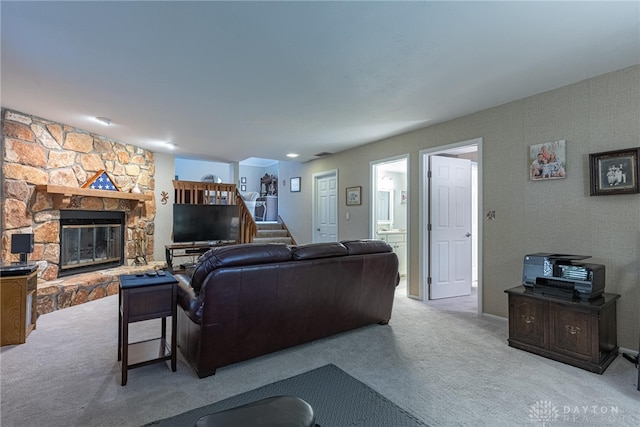 5010 Rhine Way, Centerville, OH 45458 - carpeted living area featuring a fireplace and stairway
