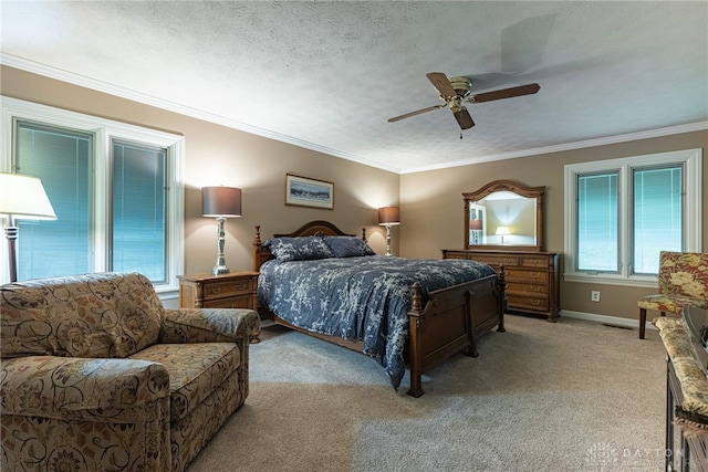 5010 Rhine Way, Centerville, OH 45458 - bedroom featuring light colored carpet, ornamental molding, ceiling fan, and a textured ceiling