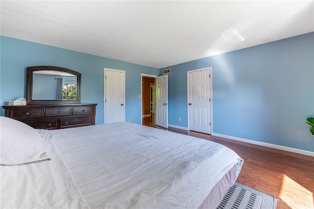 9031 S Normandy Ln, Washington Twp, OH 45458 - bedroom with baseboards and wood finished floors