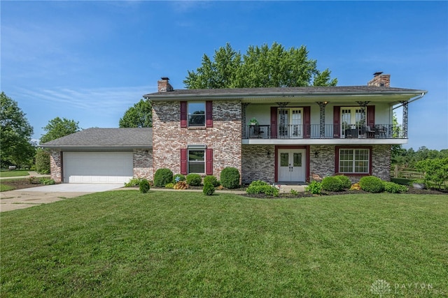 9031 S Normandy Ln, Washington Twp, OH 45458 - view of front facade with french doors, a chimney, and a front lawn