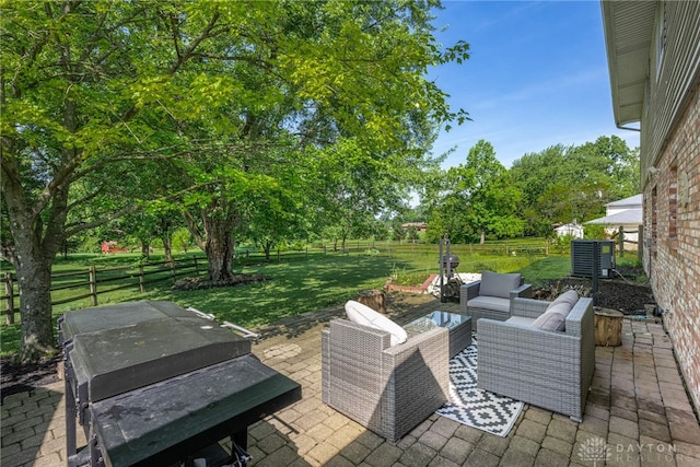 9031 S Normandy Ln, Washington Twp, OH 45458 - fenced backyard featuring a grill, a patio, outdoor lounge area, and a hot tub