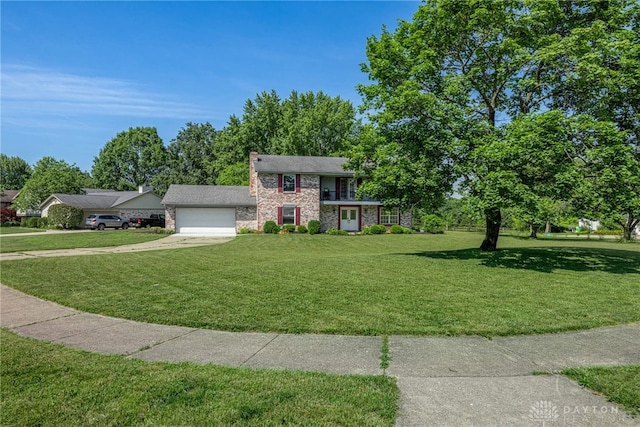 9031 S Normandy Ln, Washington Twp, OH 45458 - colonial-style house featuring an attached garage, a front lawn, concrete driveway, and a chimney