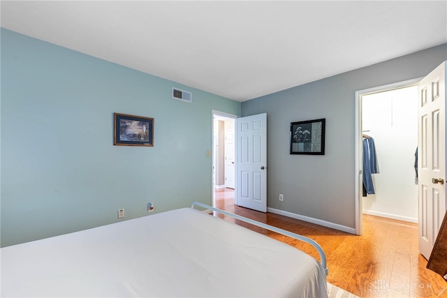 9031 S Normandy Ln, Washington Twp, OH 45458 - bedroom featuring light wood finished floors and baseboards