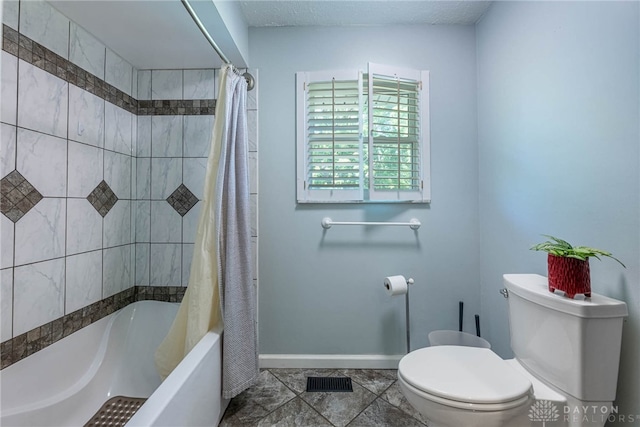 9031 S Normandy Ln, Washington Twp, OH 45458 - bathroom with shower / bath combo with shower curtain and tile patterned flooring