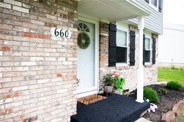 660 N Main St, Union, OH 45322 - view of exterior entry featuring brick siding