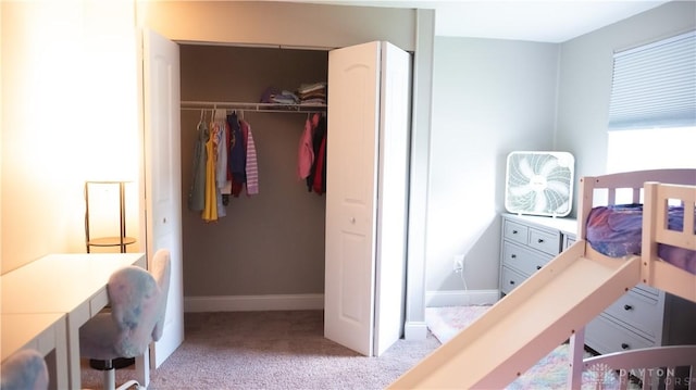 660 N Main St, Union, OH 45322 - bedroom featuring light carpet, a closet, and an office area