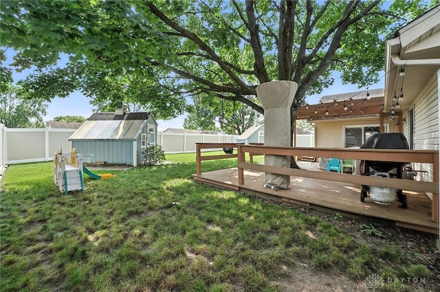 450 Overfield Pl, Troy, OH 45373 - fenced backyard featuring a deck and a shed