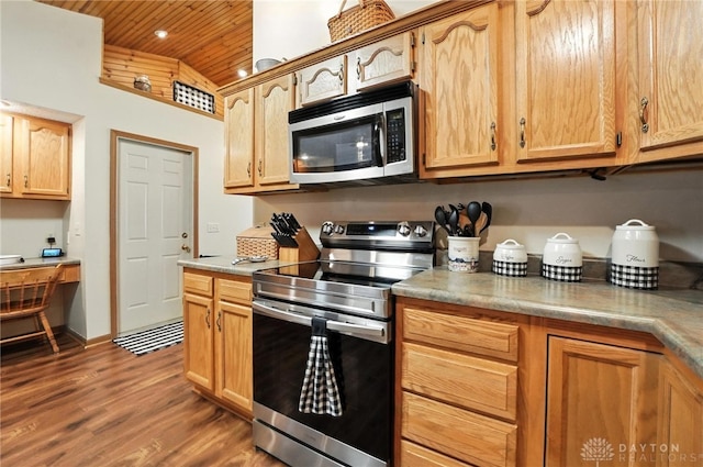 450 Overfield Pl, Troy, OH 45373 - kitchen featuring stainless steel appliances, wooden ceiling, vaulted ceiling, wood finished floors, and light countertops