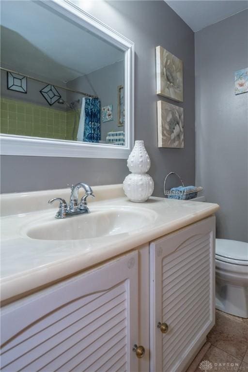 4913 Bittern Ct, Huber Heights, OH 45424 - bathroom featuring vanity, tile patterned floors, and curtained shower