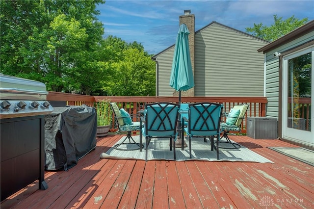 4913 Bittern Ct, Huber Heights, OH 45424 - wooden terrace with outdoor dining space and grilling area