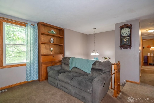 4913 Bittern Ct, Huber Heights, OH 45424 - living area with light carpet and baseboards