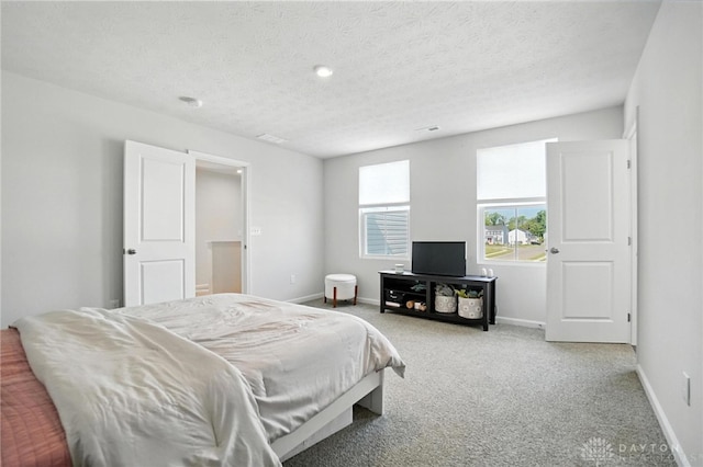 55 Spicewood Dr, Amelia, OH 45102 - carpeted bedroom featuring a textured ceiling
