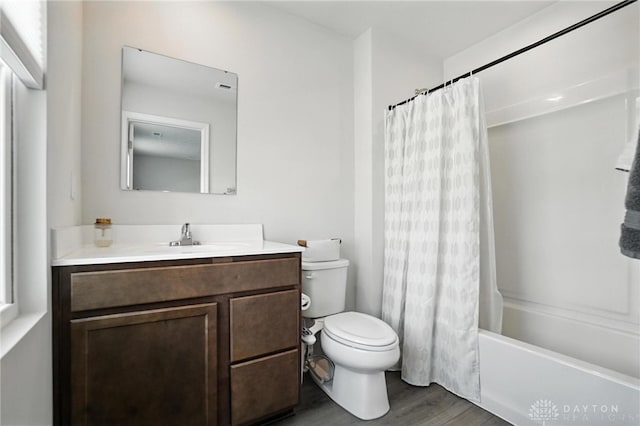 55 Spicewood Dr, Amelia, OH 45102 - bathroom featuring vanity, wood finished floors, and shower / tub combo with curtain