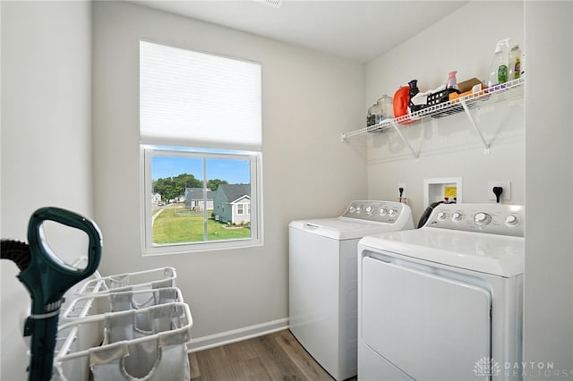 55 Spicewood Dr, Amelia, OH 45102 - laundry room featuring washer and clothes dryer and wood finished floors