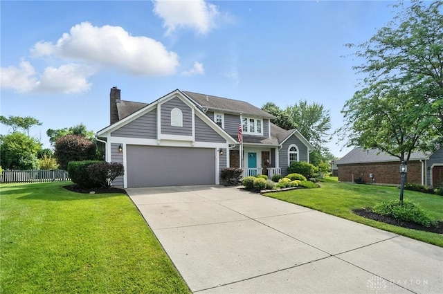 3166 Green Turtle Dr, Butler Twp, OH 45414 - traditional-style house with a chimney, concrete driveway, and a garage