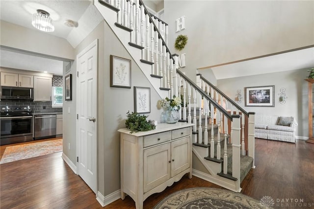 3166 Green Turtle Dr, Butler Twp, OH 45414 - stairway with wood finished floors and baseboards