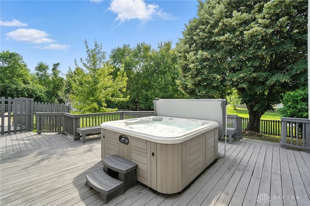 3166 Green Turtle Dr, Butler Twp, OH 45414 - wooden deck with a hot tub and view of wooded area