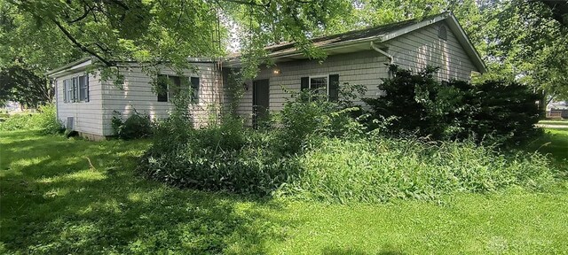 29 Elm St, Jamestown Vlg, OH 45335 - view of property exterior with a lawn