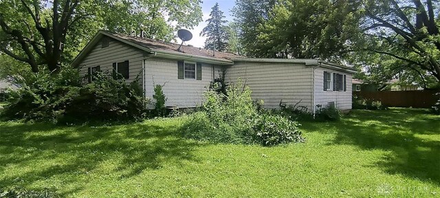 29 Elm St, Jamestown Vlg, OH 45335 - view of side of home with a lawn
