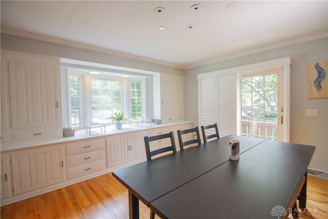 101 Blue Gate Cir Unit 1, Dayton, OH 45429 - dining area featuring plenty of natural light, light wood finished floors, and ornamental molding