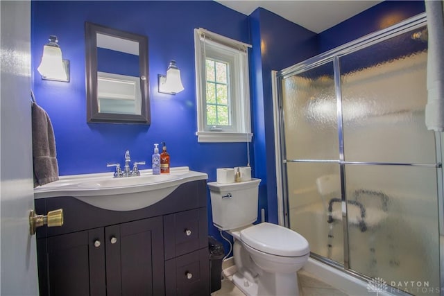 101 Blue Gate Cir Unit 1, Dayton, OH 45429 - bathroom featuring a stall shower and vanity
