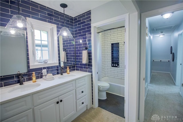 101 Blue Gate Cir Unit 1, Dayton, OH 45429 - full bathroom with double vanity, shower / bath combination with curtain, and decorative backsplash