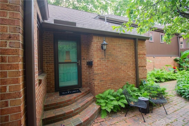 101 Blue Gate Cir Unit 1, Dayton, OH 45429 - property entrance featuring roof with shingles and brick siding
