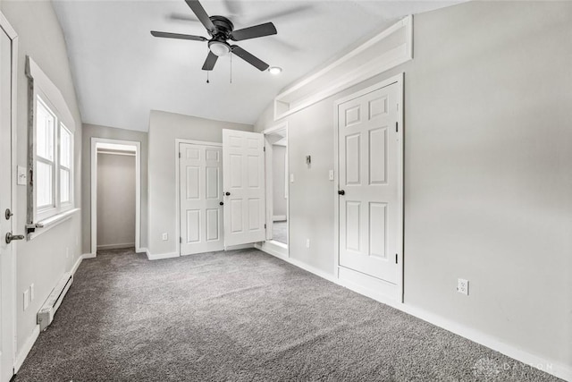 506 Virginia Ave, Troy, OH 45373 - unfurnished bedroom with carpet floors, lofted ceiling, a baseboard heating unit, and a ceiling fan