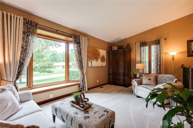 5516 Anne Ln, Washington Twp, OH 45459 - living area with light carpet, lofted ceiling, and plenty of natural light