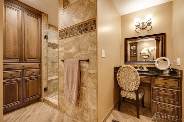 5516 Anne Ln, Washington Twp, OH 45459 - bathroom featuring walk in shower, vanity, and vaulted ceiling