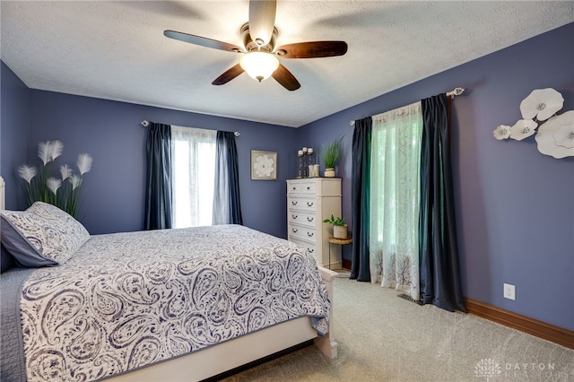 5516 Anne Ln, Washington Twp, OH 45459 - bedroom featuring carpet floors, ceiling fan, and a textured ceiling