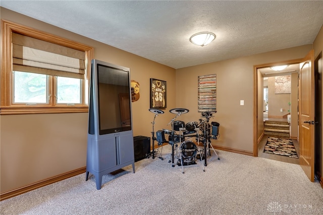 5516 Anne Ln, Washington Twp, OH 45459 - workout area with a textured ceiling and carpet floors