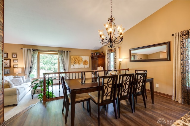 5516 Anne Ln, Washington Twp, OH 45459 - dining area featuring lofted ceiling, a chandelier, and wood finished floors