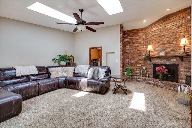 5516 Anne Ln, Washington Twp, OH 45459 - carpeted living room with a skylight, a ceiling fan, brick wall, and a fireplace