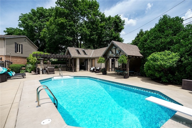 5516 Anne Ln, Washington Twp, OH 45459 - outdoor pool with an exterior structure, an outdoor structure, a diving board, a patio area, and a pergola