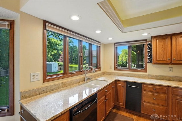 1101 Fox Chase Ct, Centerville, OH 45459 - kitchen featuring black dishwasher, light stone countertops, brown cabinets, and recessed lighting